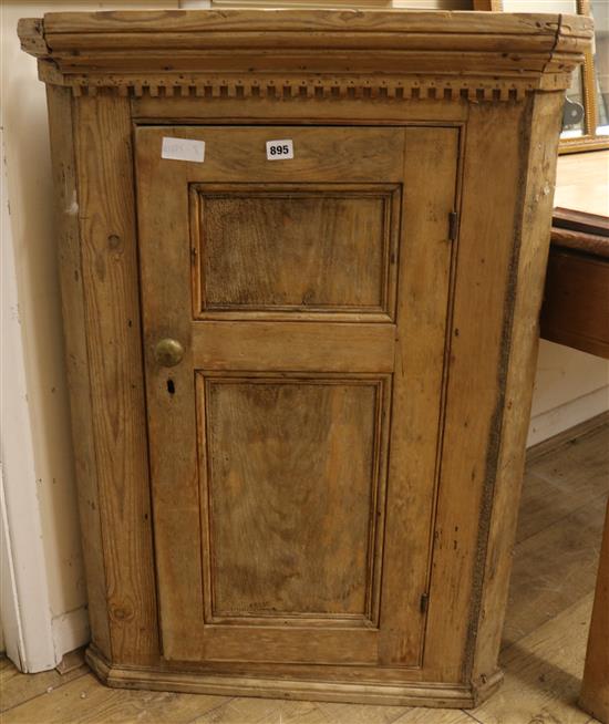 A pine corner cupboard W.68cm